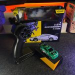 Green BMW M4 1:64 Mini Alloy RC Drift Car by YEGAO with LED headlights, black rear spoiler and 2.4GHz remote controller