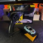 Cyan Porsche 911 GT3 RS 1:64 Mini Alloy RC Drift Car by YEGAO with LED headlights, checker graphics and black rear spoiler
