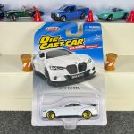 MSZ BMW 3.0 CSL white diecast car with gold wheels and working suspension