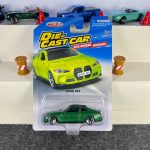 BMW M4 green diecast car with silver wheels and working suspension – MSZ
