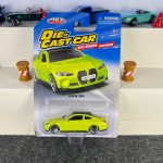 BMW M4 lime green diecast car with silver wheels and working suspension – MSZ