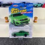 BMW M850i green diecast car with black wheels and working suspension – MSZ