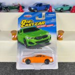 BMW M850i orange diecast car with black wheels and working suspension – MSZ