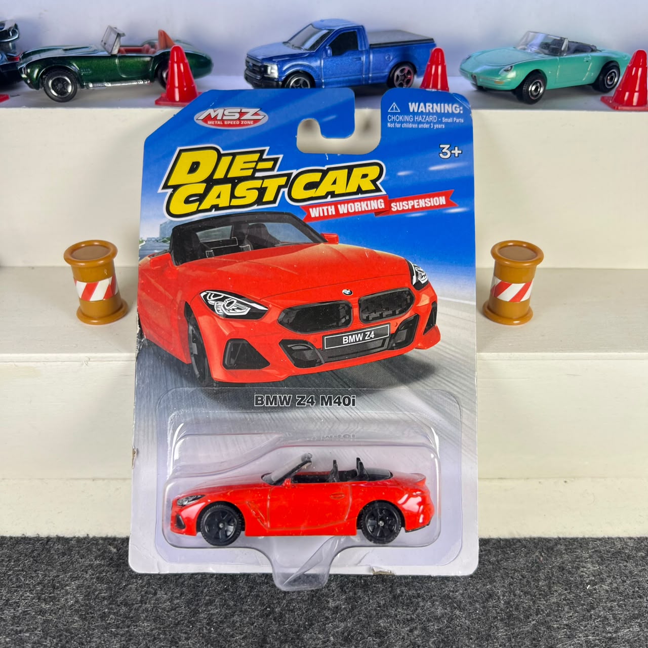 BMW Z4 M40i red diecast car with black wheels, open-top cabin and working suspension – MSZ BMW Z4 M40i red diecast car with black wheels, open-top cabin and working suspension – MSZ