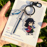 Giyu Tomioka Demon Slayer acrylic keychain charm with blue sword and fish accessory