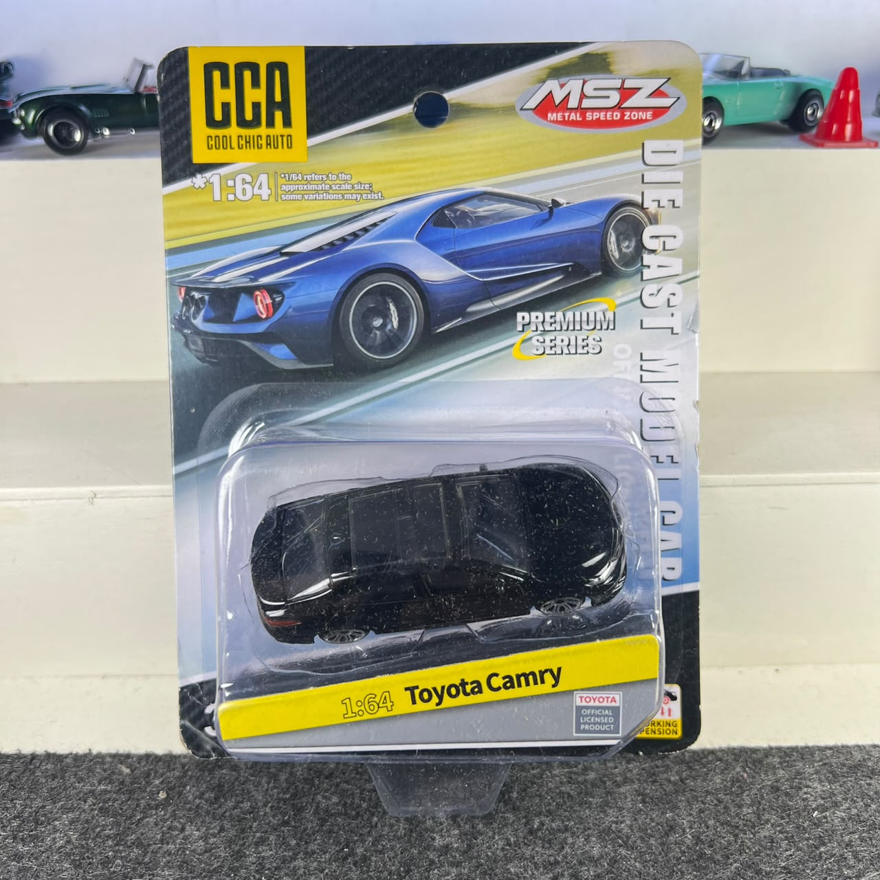 Toyota Camry black 1:64 diecast car with working suspension and official Toyota licensed CCA packaging Toyota Camry black 1:64 diecast car with working suspension and official Toyota licensed CCA packaging