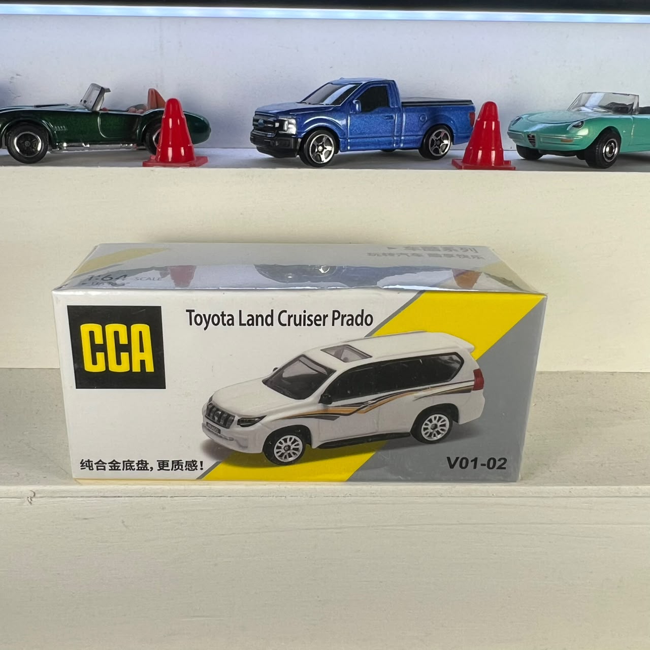 Toyota Land Cruiser Prado white 1:64 diecast SUV with alloy base and CCA box packaging Toyota Land Cruiser Prado white 1:64 diecast SUV with alloy base and CCA box packaging