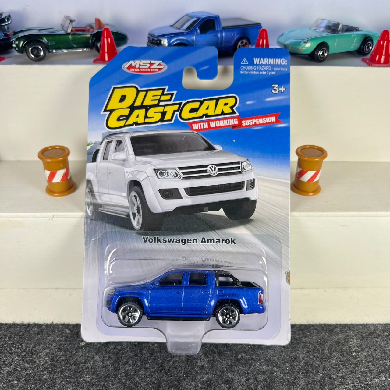 Volkswagen Amarok blue diecast pickup with silver wheels, open cargo bed and working suspension – MSZ Volkswagen Amarok blue diecast pickup with silver wheels, open cargo bed and working suspension – MSZ