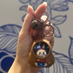 Brown Labubu Light Up Keychain with bell and transparent capsule