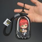 Gaara chibi mini figure with red hair, green eyes and sand gourd inside transparent black display case