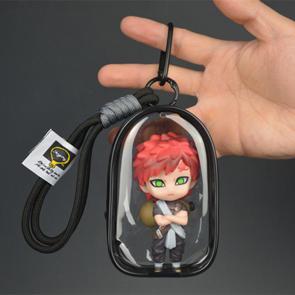 Gaara chibi mini figure with red hair, green eyes and sand gourd inside transparent black display case Gaara chibi mini figure with red hair, green eyes and sand gourd inside transparent black display case