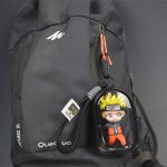 Sasuke Uchiha chibi mini figure inside transparent black display case with hanging clip and wrist strap