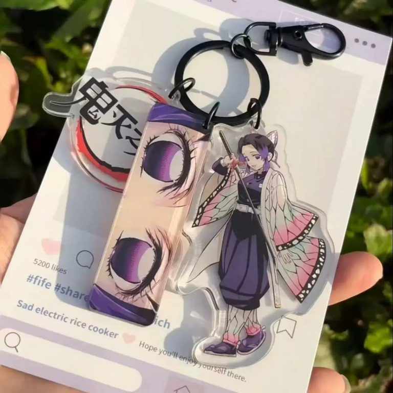 Shinobu Kocho Keyring with three Demon Slayer anime charms and purple butterfly design