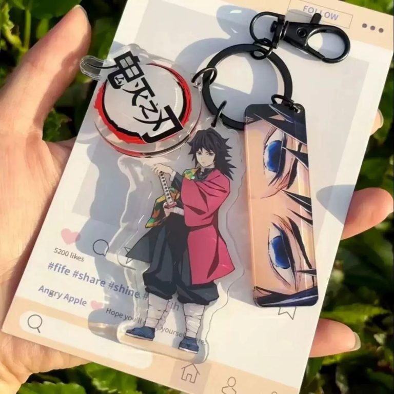 Giyu Tomioka Keyring with three Demon Slayer anime-inspired charms and Water Hashira character design