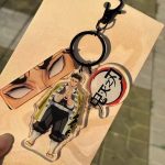 Gyomei Himejima Keyring with three Demon Slayer anime charms and Stone Hashira character artwork