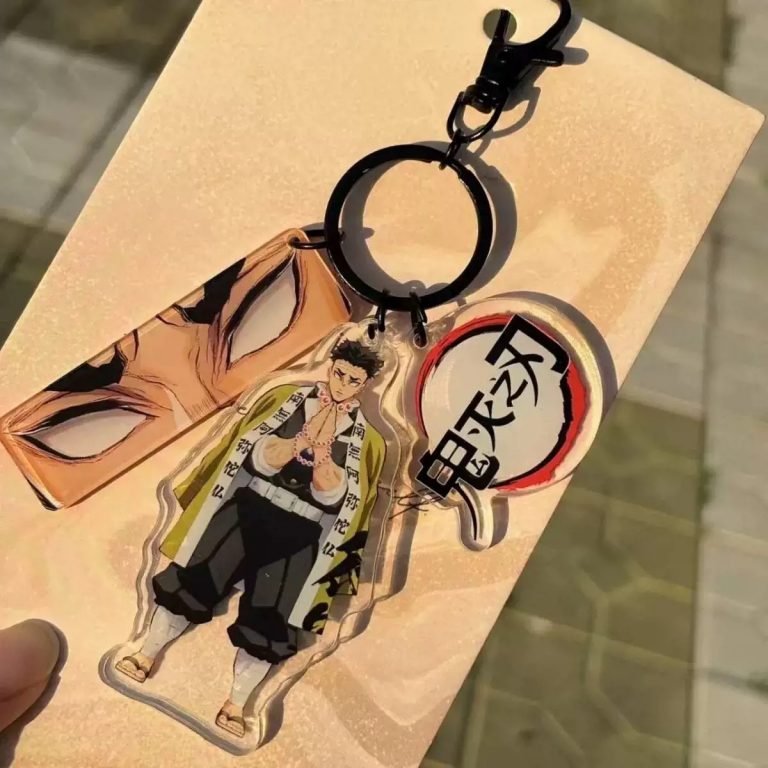 Gyomei Himejima Keyring with three Demon Slayer anime charms and Stone Hashira character artwork