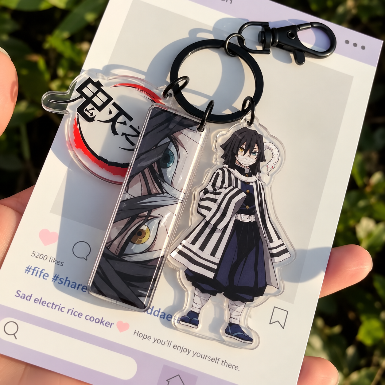 Obanai Iguro Eye Keyring with Demon Slayer Logo Obanai Iguro Eye Keyring with Demon Slayer Logo